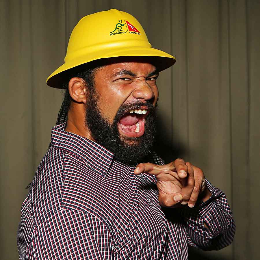 Tatafu Polota-Nau models one of the golden safari hats to be given away to Wallabies fans in order to combat the 'sea of red'