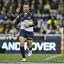 The Brumbies' Nic White leaves the field with a shoulder injury