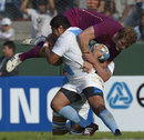 England's Joe Launchbury is tackled by Argentina's Maximiliano Bustos
