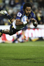 The Brumbies' Henry Speight scores a try against the Rebels