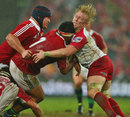 The Lions' Mako Vunipola clashes with the Reds' Beau Robinson