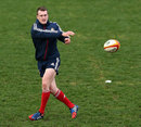 Scotland's Stuart Hogg spins a pass during a Lions training session