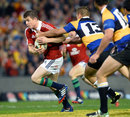 The Lions' Brian O'Driscoll takes on Combined Country's Lewie Catt
