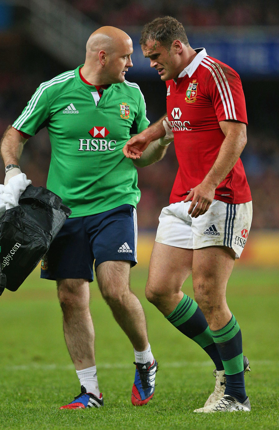 Lions centre Jamie Roberts hobbles from the field