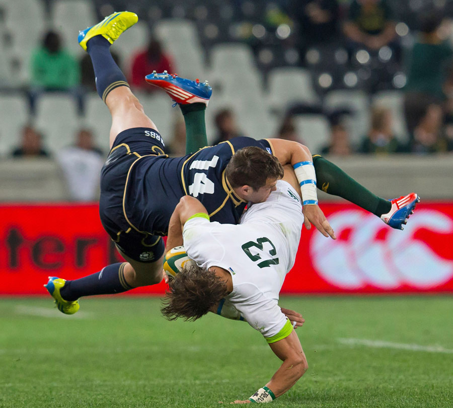 South Africa's JJ Engelbrecht is tackled by Scotland's Tommy Seymour 
