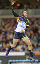 The Brumbies' Jesse Mogg celebrates his side's victory over the Lions