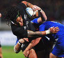 New Zealand's Ma'a Nonu is shackled by the France defence