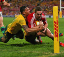 Australia's Israel Folau does just enough to deny the Lions' George North a score