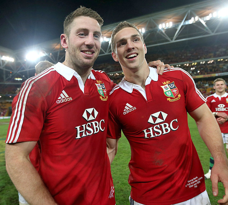 The Lions' Alex Cuthbert and George North celebrate beating Australia
