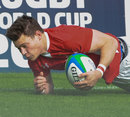 Wales Under-20s winger Ashley Evans touches down for a try