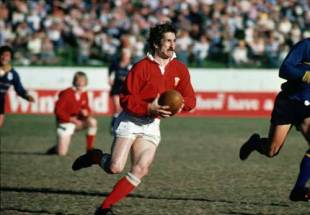 Wales wing Gerald Davies surges forward on a trademark run during a tour match on the 1978 Wales tour to Australia.