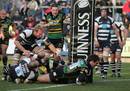 Northampton's Ben Foden scores a try as Bristol's Shaun Perry attempts to stop him