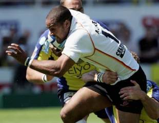 The Dragons' Nathan Brew is tackled as he goes for the line during the European Challenge Cup clash with Clermont Auvergne at Stade Marcel Michelin in Clermont Ferrand, France on April 21, 2007.