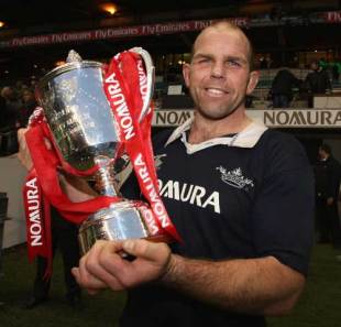 Former All Black Anton Oliver holds the trophy after his Oxford University team's victory in the varsity match against Cambridge University at Twickenham in London, England on December 11, 2008.