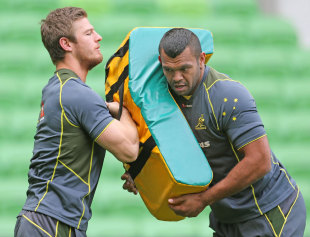 Kurtley Beale tackles during a Wallabies training session at AAMI Park, Melbourne, June 27, 2013