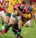 Australia's James Horwill tackles the Lions' George North