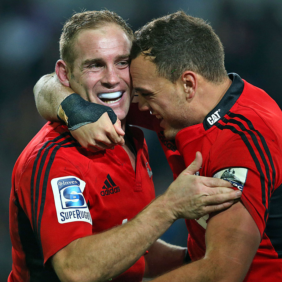The Crusaders' Andy Ellis and Israel Dagg celebrate the scrum-half's try