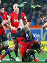 The Highlanders Ma'a Nonu tackles the Crusaders' Tom Marshall 