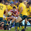 The Lions' Ben Youngs is surrounded by Wallabies