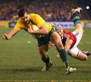 Australia's Adam Ashley-Cooper forces his way to the line for the crucial score