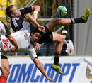New Zealand's Tim Mikkelson attempts to claim the ball