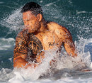 Australia's Israel Folau takes part in a recovery session in the sea