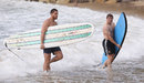 Sean Maitland and Leigh Halfpenny after surfing on the coast at Noosa