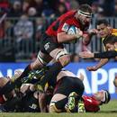 The Crusaders' Kieran Read leaps over a ruck