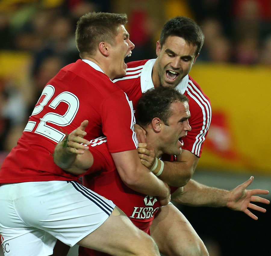 Lions Owen Farrell, Jamie Roberts and Conor Murray celebrate