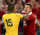 The Lions' Tommy Bowe faces up to Australia's Kurtley Beale