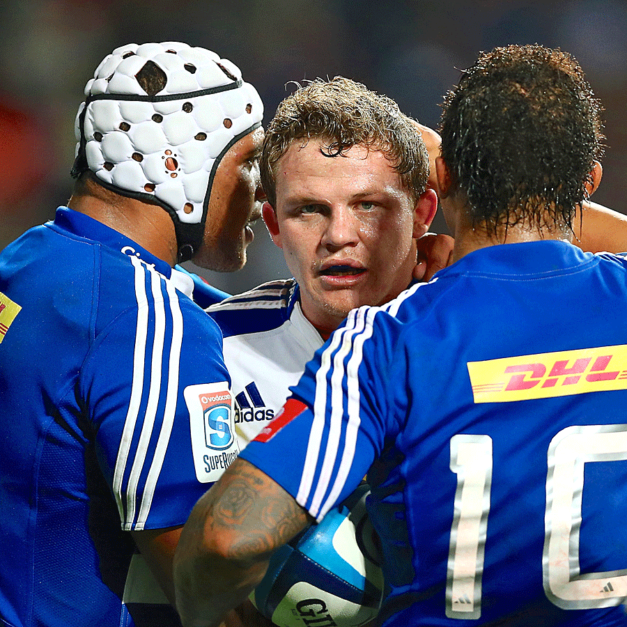 The Stormers' Deon Fourie celebrates a try with Nizaam Carr and Elton Jantjies