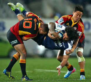 The Blues' Rene Ranger is up-ended by the Chiefs' defence, Blues v Chiefs, Super Rugby, Eden Park, Auckland, July 13, 2013
