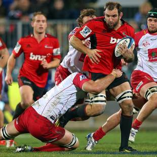 The Crusaders' George Whitelock breaks a tackle against the Reds, Crusaders v Queensland Reds, Super Rugby, Super Rugby qualifiers, AMI Stadium, Christchurch, July 20, 2013