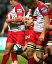 The Crusaders' Tom Marshall celebrates a try against the Reds