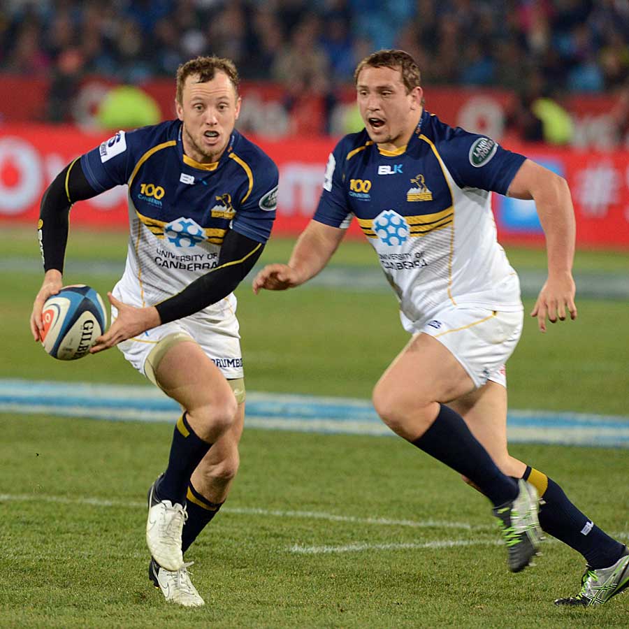 The Brumbies' Jesse Mogg launches an attack against the Bulls