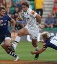 Leicester Tigers' Blaine Scully tries to breakaway from the Sale tackler