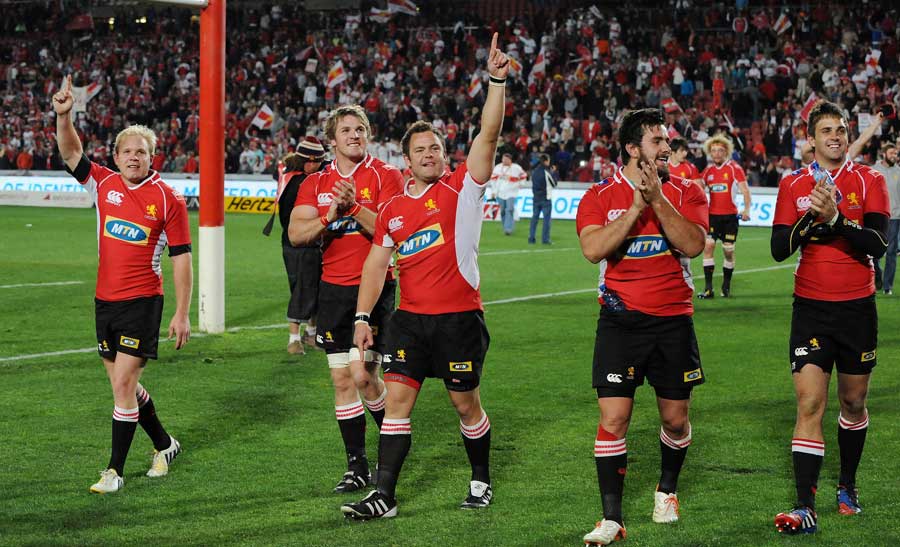 The Lions celebrate winning over two legs against the Kings