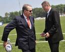IOC Chairman Jacques Rogge (L) passes a ball to IRB Chairman Bernard Lapasset (R) 