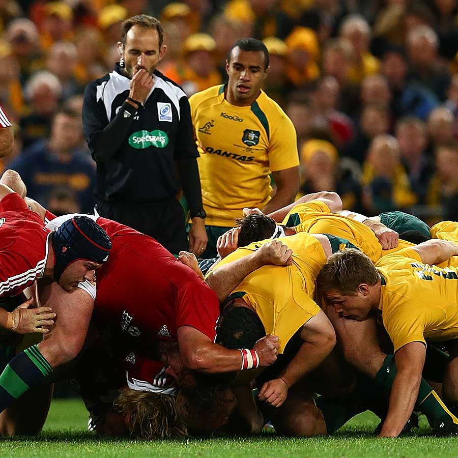 The Wallabies and Lions engage in a a scrum