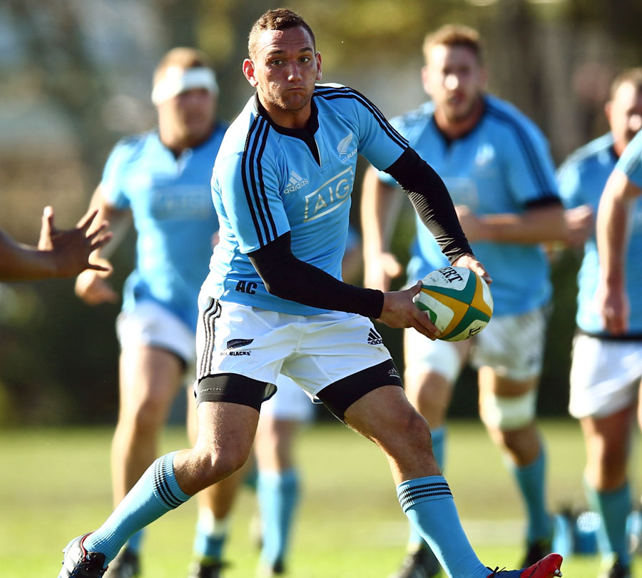 All Blacks fly-half Aaron Cruden spins the ball in training