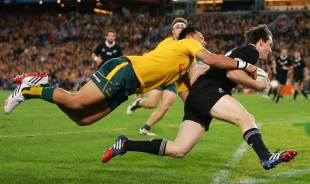 Australia's Christian Lealiifano is powerless to prevent Ben Smith scoring the first try of the game, Australia v New Zealand, Rugby Championship, ANZ Stadium, Sydney, August 17, 2013