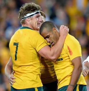 Australia's Will Genia is congratulated on scoring their first try, Australia v New Zealand, Rugby Championship, ANZ Stadium, Sydney, August 17, 2013