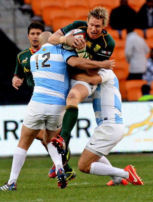 South Africa's Jean de Villiers is shackled by the Argentina defence, South Africa v Argentina, Rugby Championship, FNB Stadium, Johannesburg, August 17, 2013