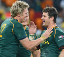 South Africa's Jean de Villiers is congratulated on a try by team-mate Morne Steyn