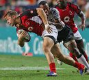 Canada's Harry Jones touches down for the try