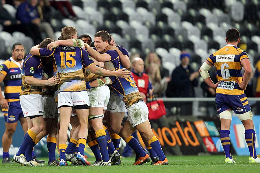 Otago celebrate victory in front of dejected Carl Axtens