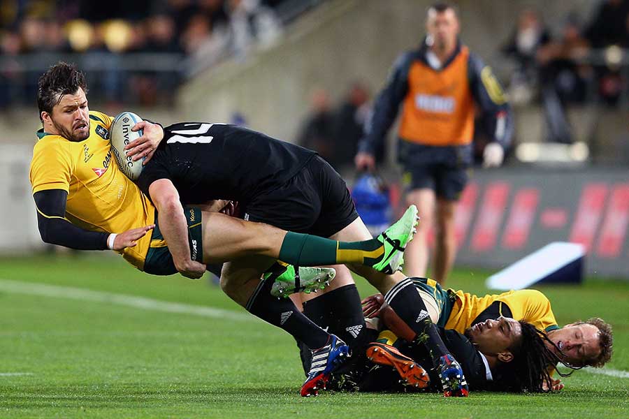 New Zealand's Ben Smith tackles Australia's Adam Ashley-Cooper