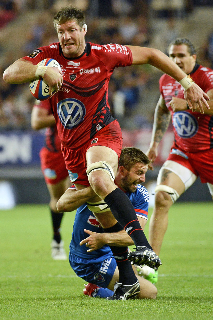 Grenoble's Benjamin Thierry attempts to tackle Toulon's Bakkies Botha