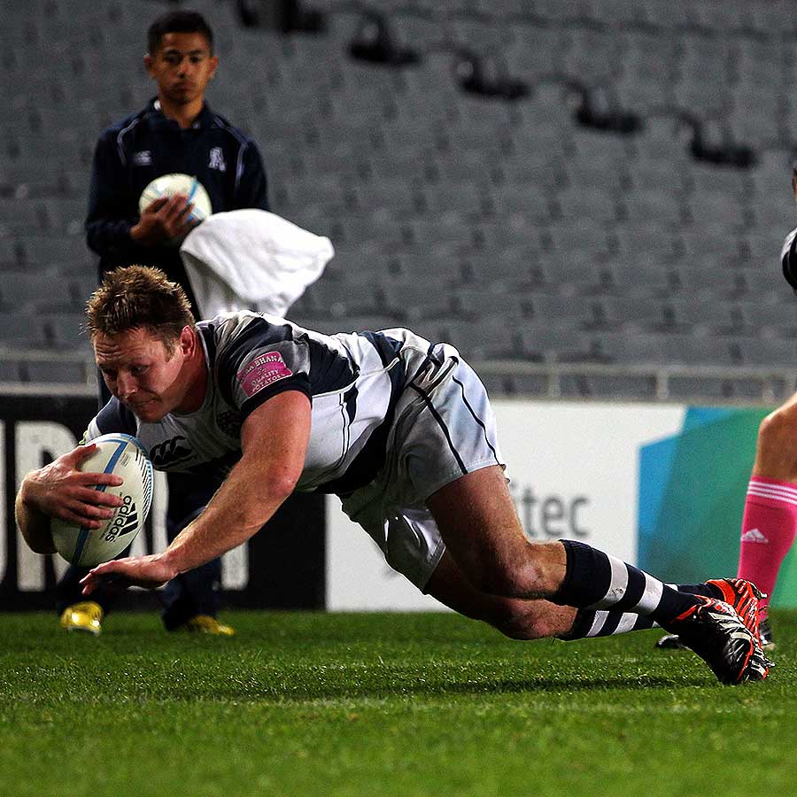Auckland's Tom McCartney scores the match-winning try