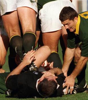 Sean Fitzpatrick reacts to being stamped on by Andre Venter, New Zealand v South Africa, August 9, 1997